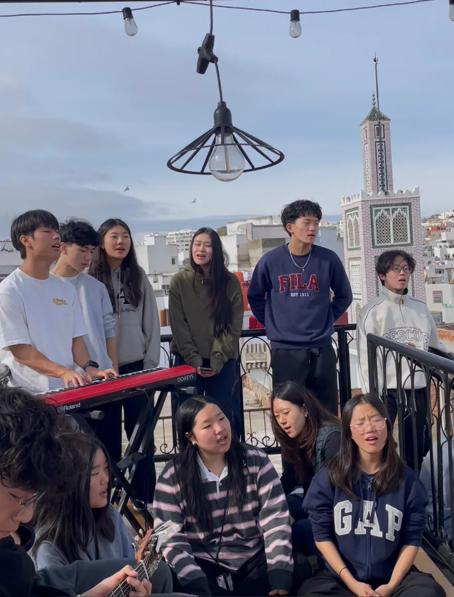 Youth worshipping on a rooftop in Morocco